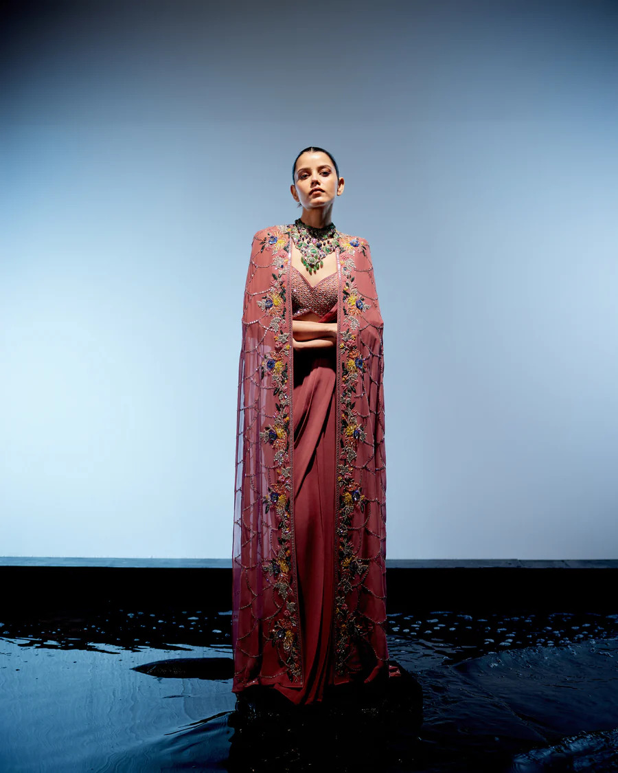 A model showcasing Sienna Drape Saree by Miku Kumar from Miku Kumar's collection