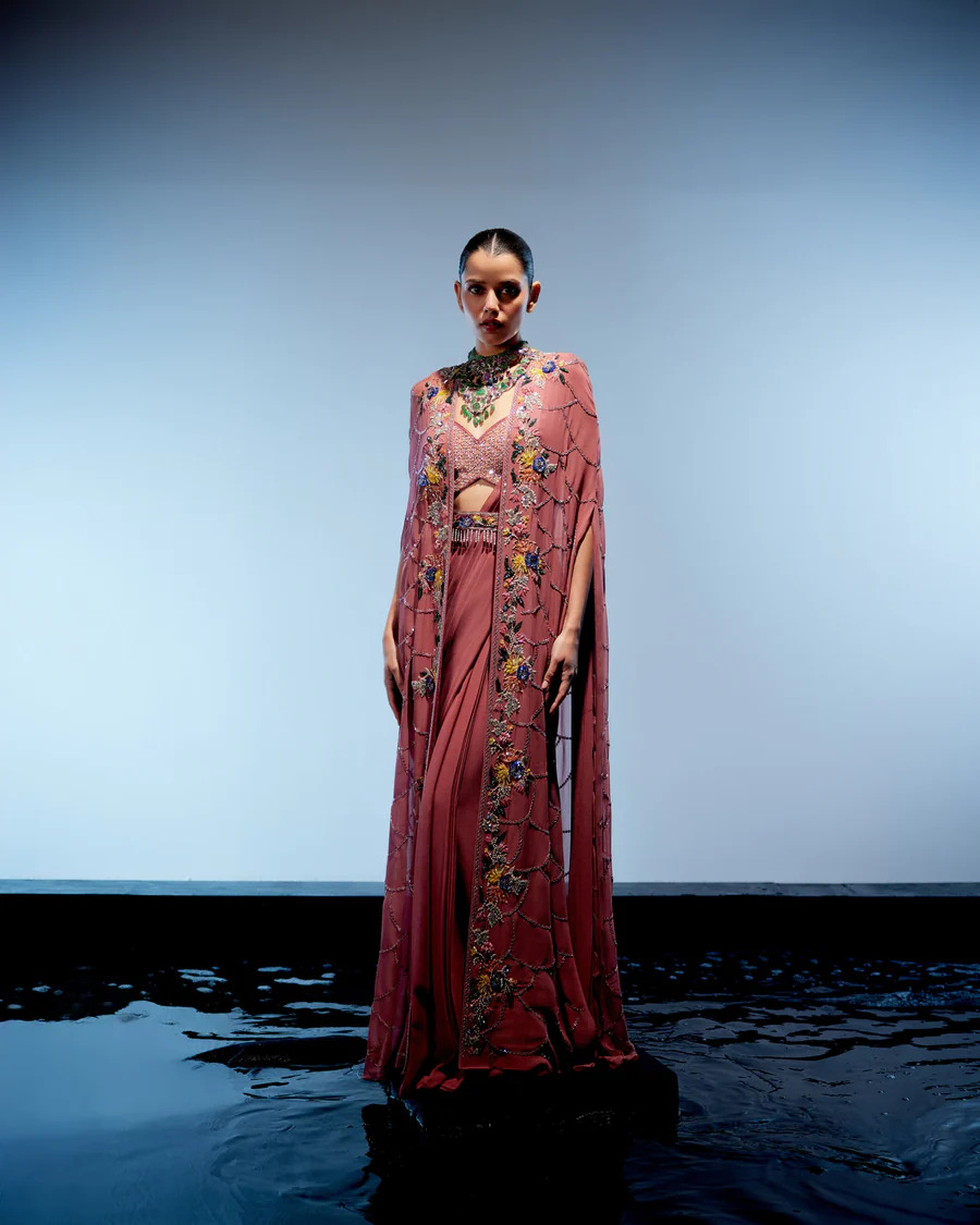 A model showcasing Sienna Drape Saree by Miku Kumar from Miku Kumar's collection
