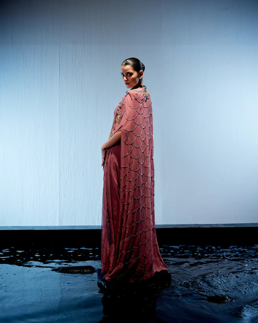 A model showcasing Sienna Drape Saree by Miku Kumar from Miku Kumar's collection