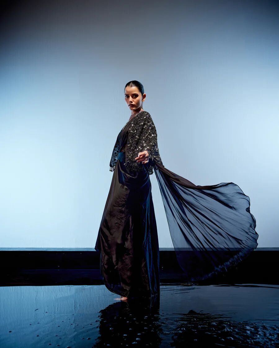 A model showcasing Eloise Drape Saree by Miku Kumar from Miku Kumar's collection