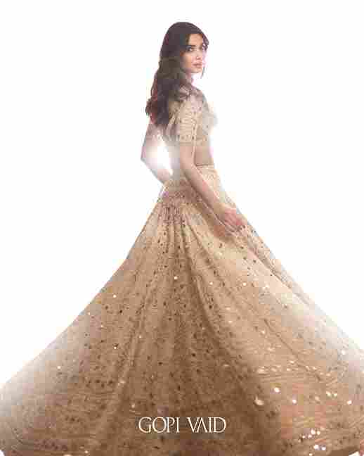 A model showcasing Diana In Raima Lehenga Set by Gopi Vaid from Gopi Vaid's collection