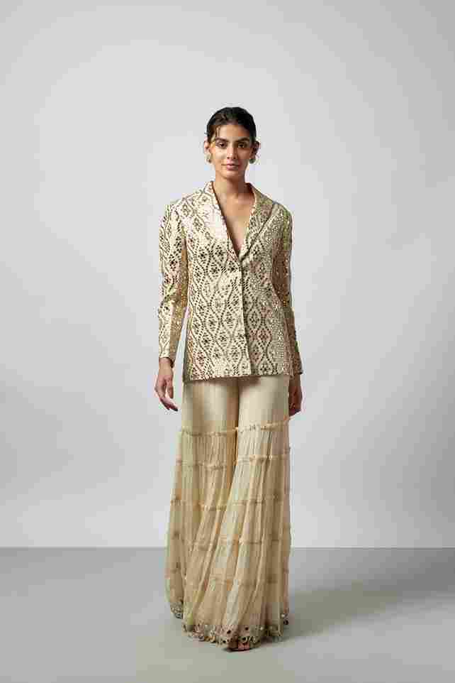 A model showcasing Agasti Sharara Set by Gopi Vaid from Gopi Vaid's collection