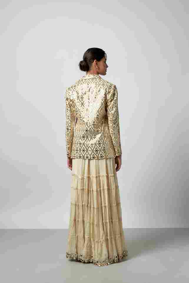 A model showcasing Agasti Sharara Set by Gopi Vaid from Gopi Vaid's collection