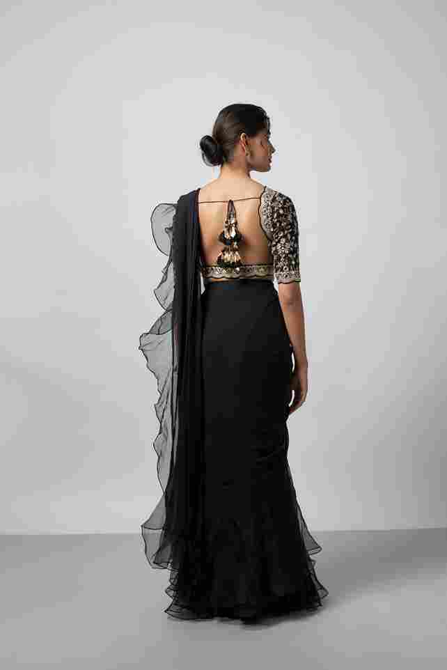 A model showcasing Ganika Saree Set by Gopi Vaid from Gopi Vaid's collection