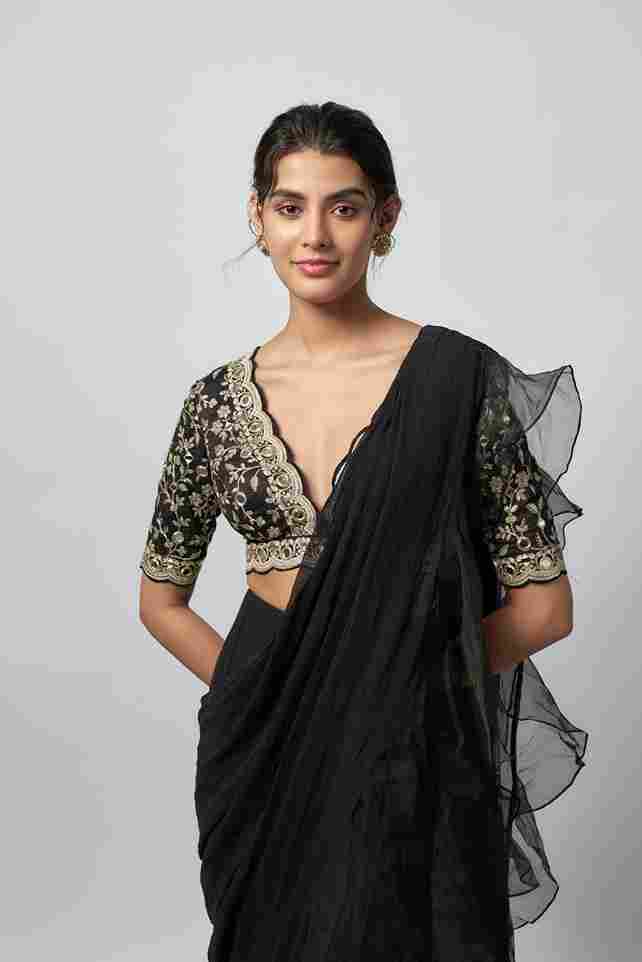 A model showcasing Ganika Saree Set by Gopi Vaid from Gopi Vaid's collection