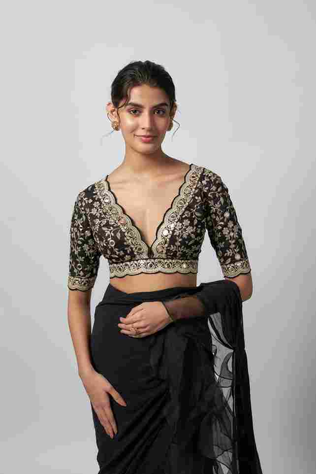 A model showcasing Ganika Saree Set by Gopi Vaid from Gopi Vaid's collection