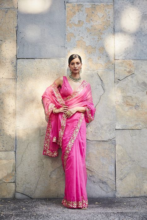 A model showcasing Fuschia Silk Organza Saree by Ranian from Ranian's collection