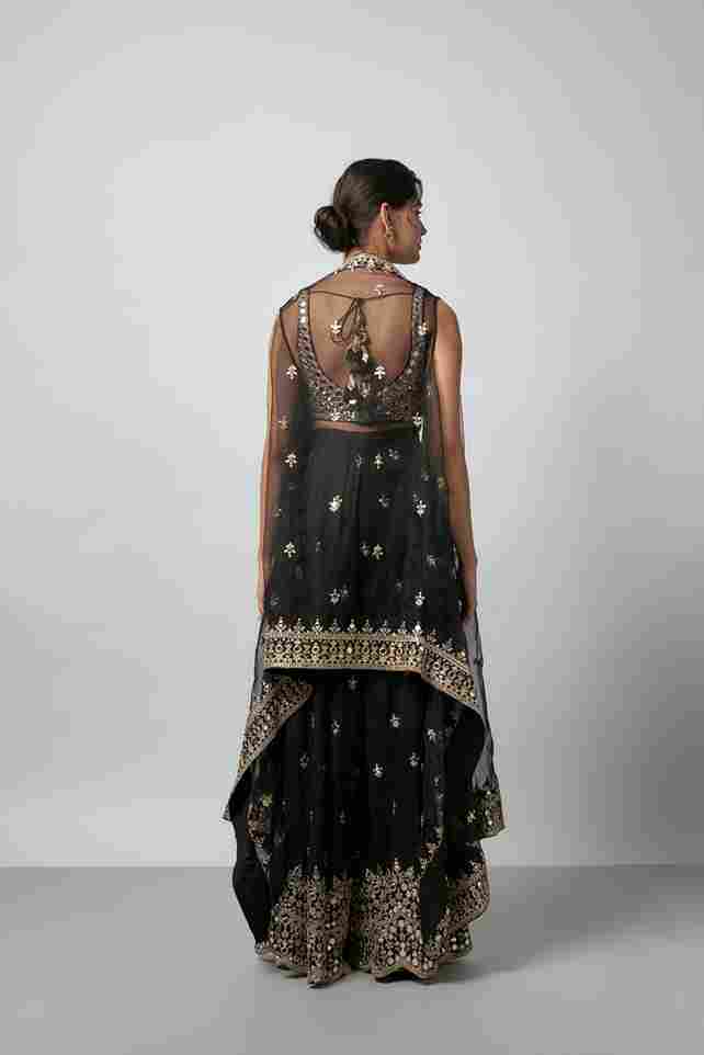 A model showcasing Avnoor Pant Set by Gopi Vaid from Gopi Vaid's collection A model showcasing Avnoor Pant Set by Gopi Vaid from Gopi Vaid's collection