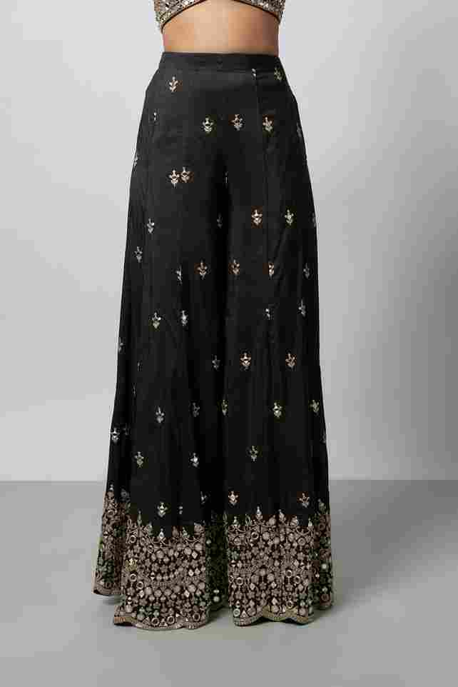 A model showcasing Avnoor Pant Set by Gopi Vaid from Gopi Vaid's collection A model showcasing Avnoor Pant Set by Gopi Vaid from Gopi Vaid's collection