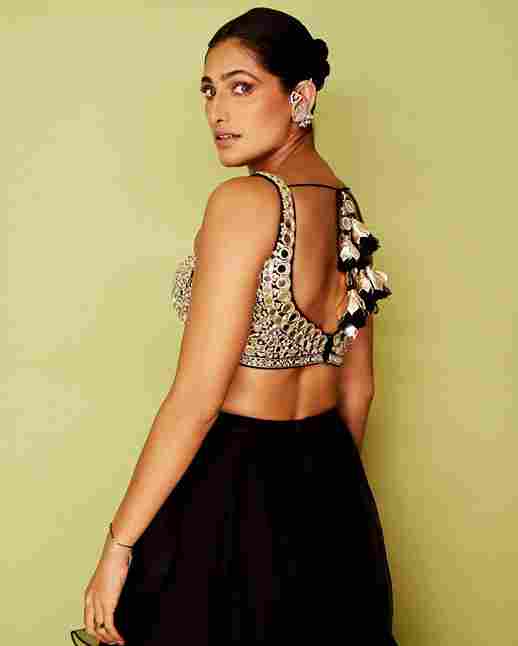 A model showcasing Gandhara Skirt Set by Gopi Vaid from Gopi Vaid's collection