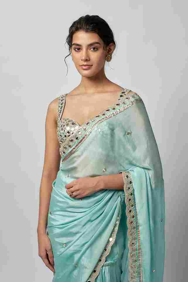 A model showcasing Anusha Saree Set by Gopi Vaid from Gopi Vaid's collection