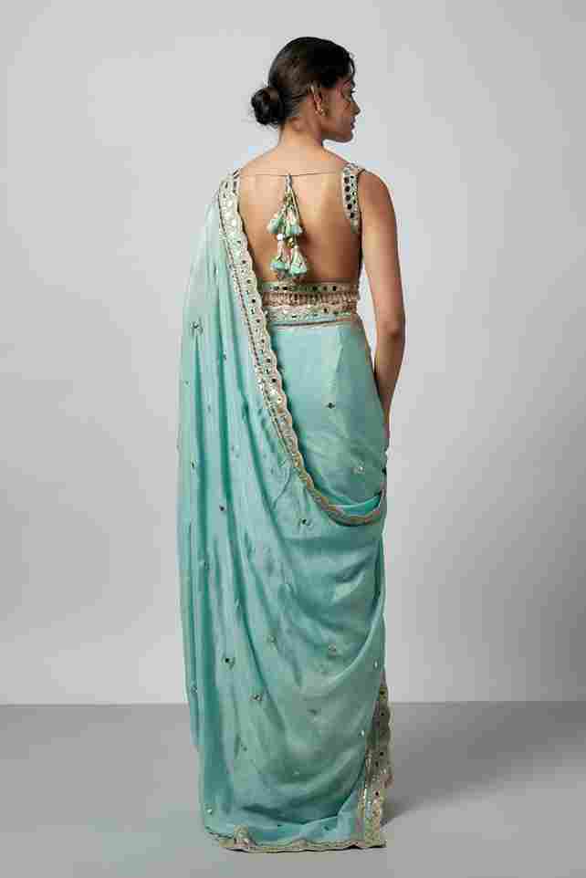A model showcasing Anusha Saree Set by Gopi Vaid from Gopi Vaid's collection