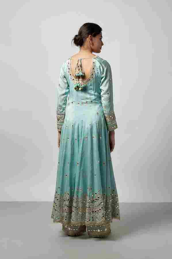A model showcasing Fahar Ag Set by Gopi Vaid from Gopi Vaid's collection