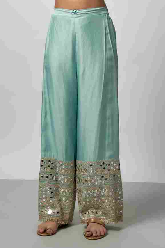 A model showcasing Fahar Ag Set by Gopi Vaid from Gopi Vaid's collection