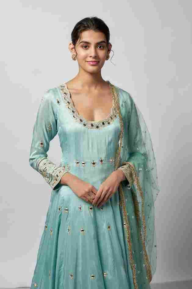 A model showcasing Fahar Ag Set by Gopi Vaid from Gopi Vaid's collection