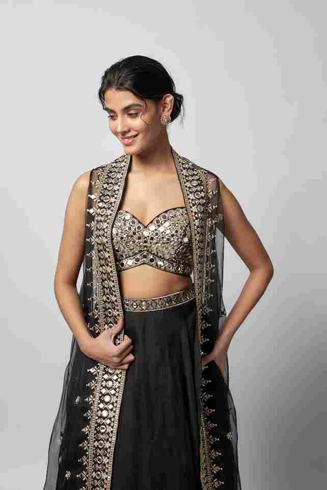 A model showcasing Chandana Lehenga Set by Gopi Vaid from Gopi Vaid's collection