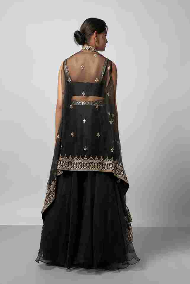 A model showcasing Chandana Lehenga Set by Gopi Vaid from Gopi Vaid's collection