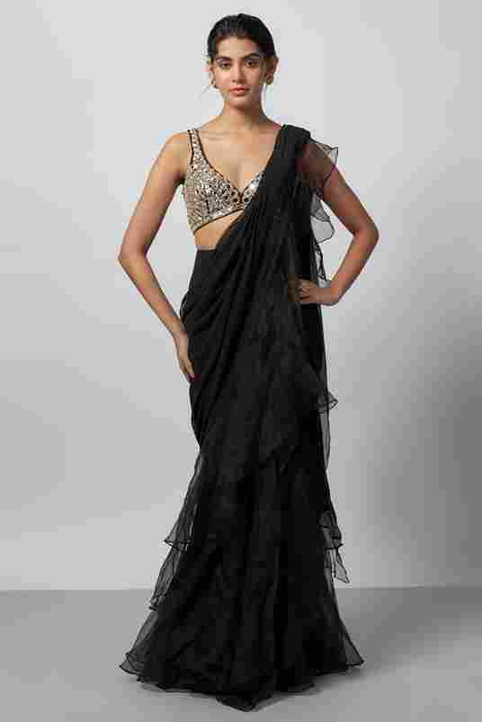 A model showcasing Oorja Saree Set by Gopi Vaid from Gopi Vaid's collection