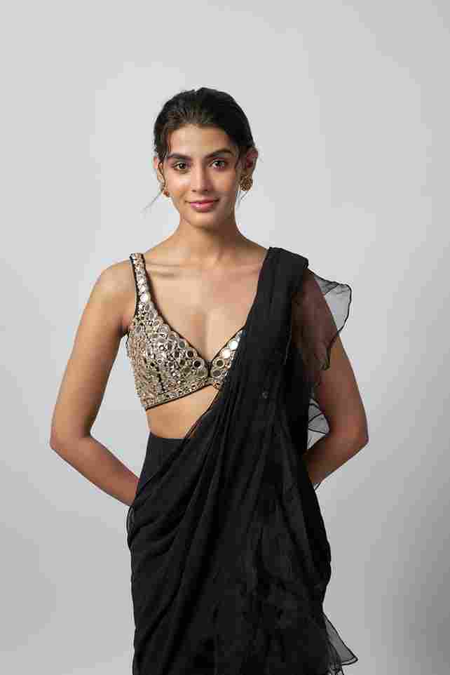 A model showcasing Oorja Saree Set by Gopi Vaid from Gopi Vaid's collection