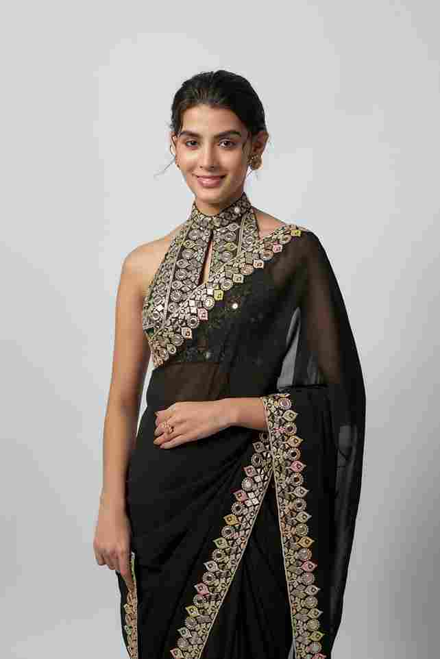 A model showcasing Ragini Saree Set by Gopi Vaid from Gopi Vaid's collection