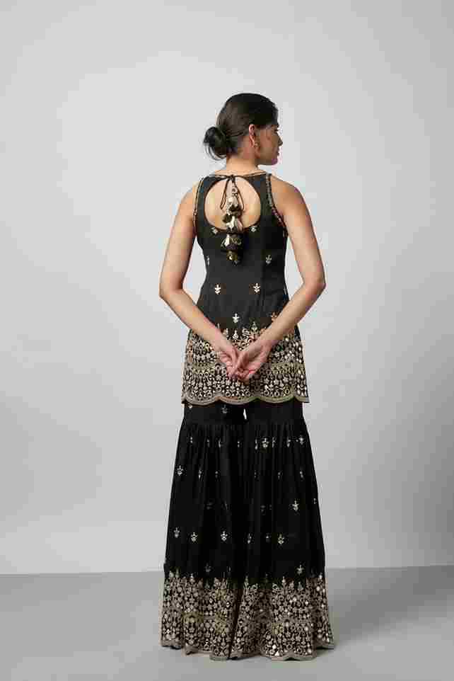 A model showcasing Yukta Sharara Set by Gopi Vaid from Gopi Vaid's collection