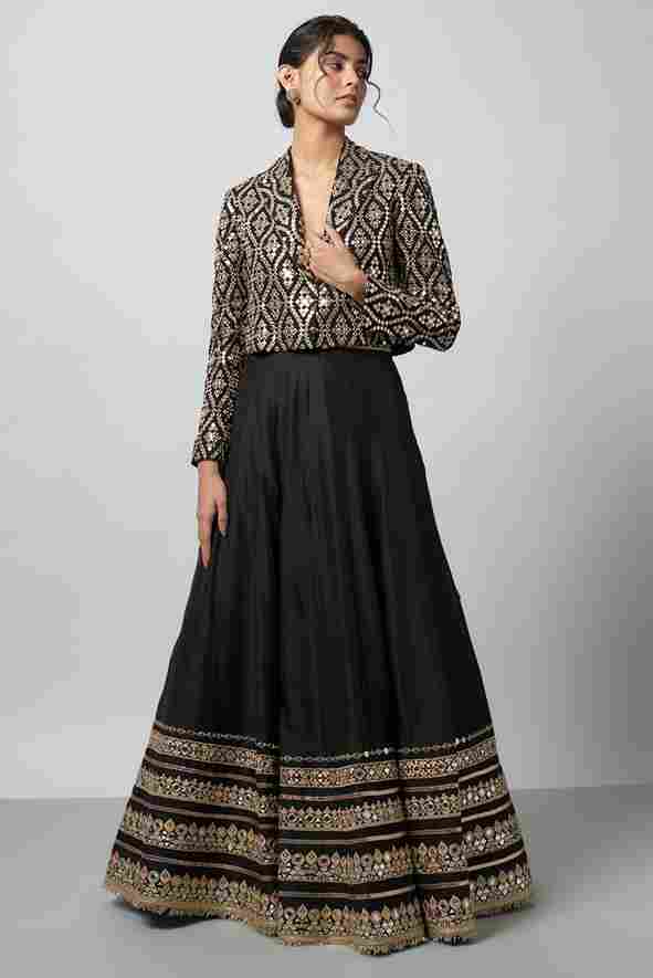 A model showcasing Leya Skirt Set by Gopi Vaid from Gopi Vaid's collection