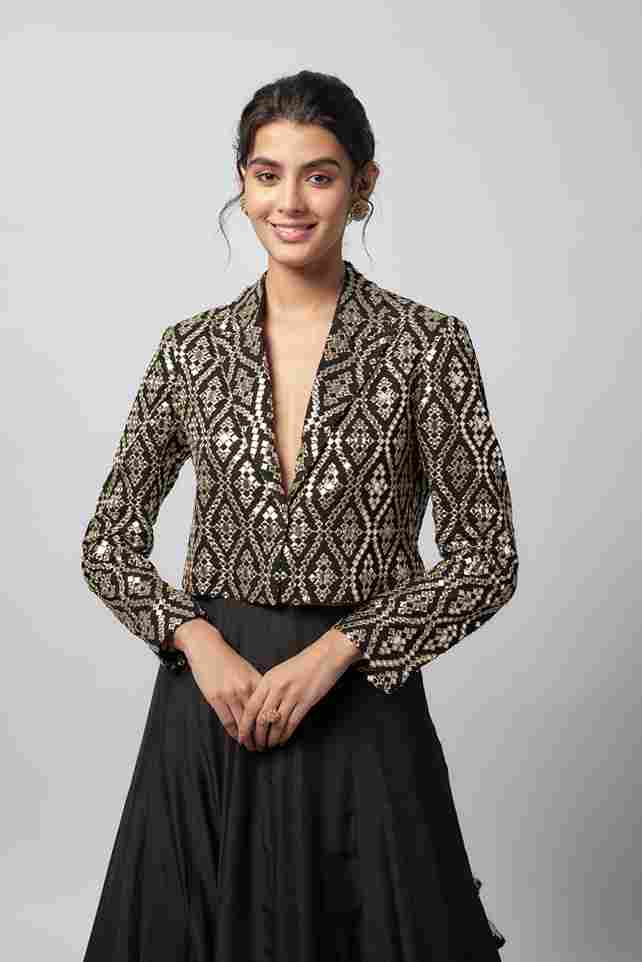 A model showcasing Leya Skirt Set by Gopi Vaid from Gopi Vaid's collection