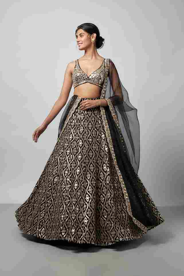 A model showcasing Ganishka Lehenga Set by Gopi Vaid from Gopi Vaid's collection