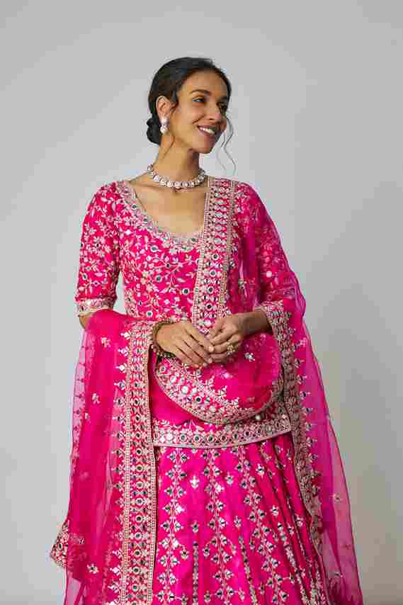 A model showcasing Abhirami Lehenga Set by Gopi Vaid from Gopi Vaid's collection