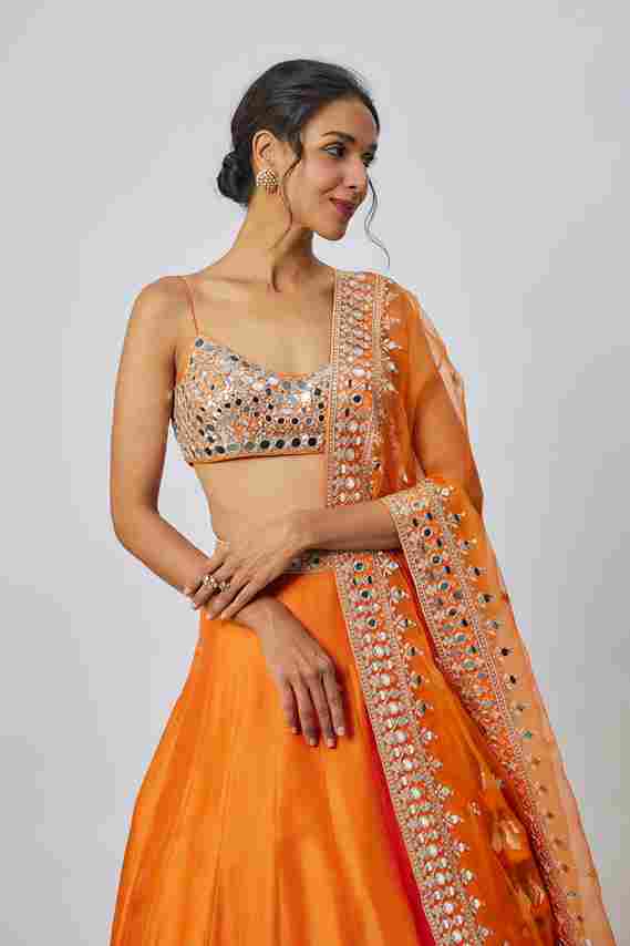 A model showcasing Janya Lehenga Set by Gopi Vaid from Gopi Vaid's collection A model showcasing Janya Lehenga Set by Gopi Vaid from Gopi Vaid's collection