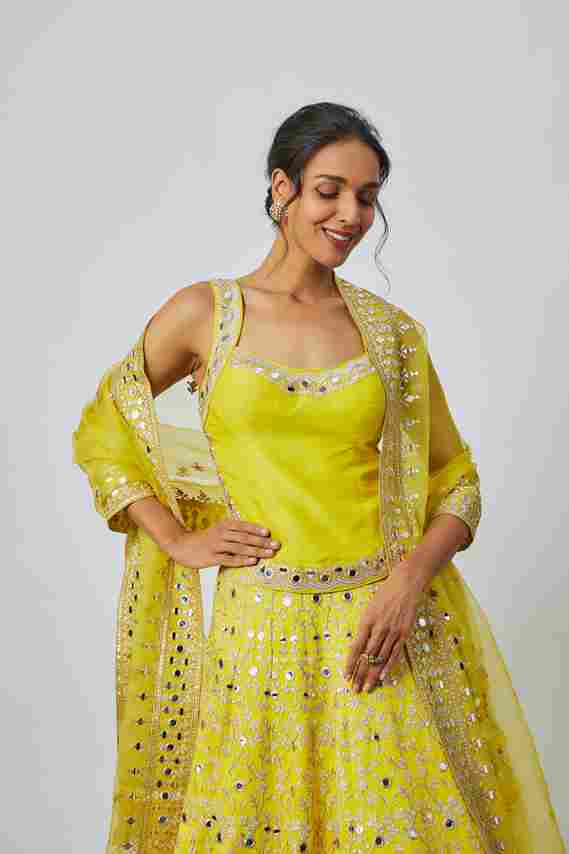 A model showcasing Tisya Lehenga Set by Gopi Vaid from Gopi Vaid's collection