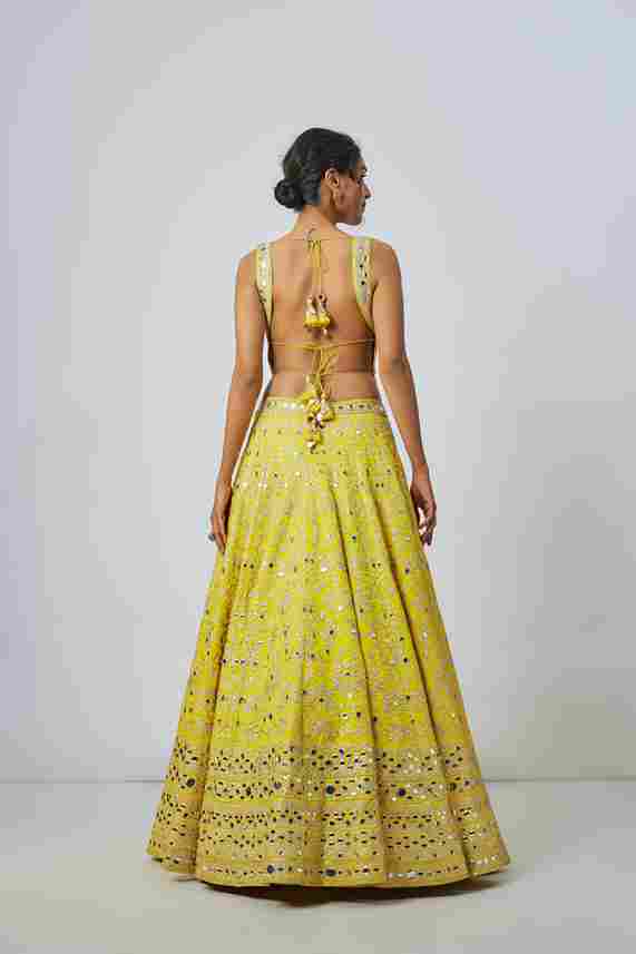 A model showcasing Tisya Lehenga Set by Gopi Vaid from Gopi Vaid's collection