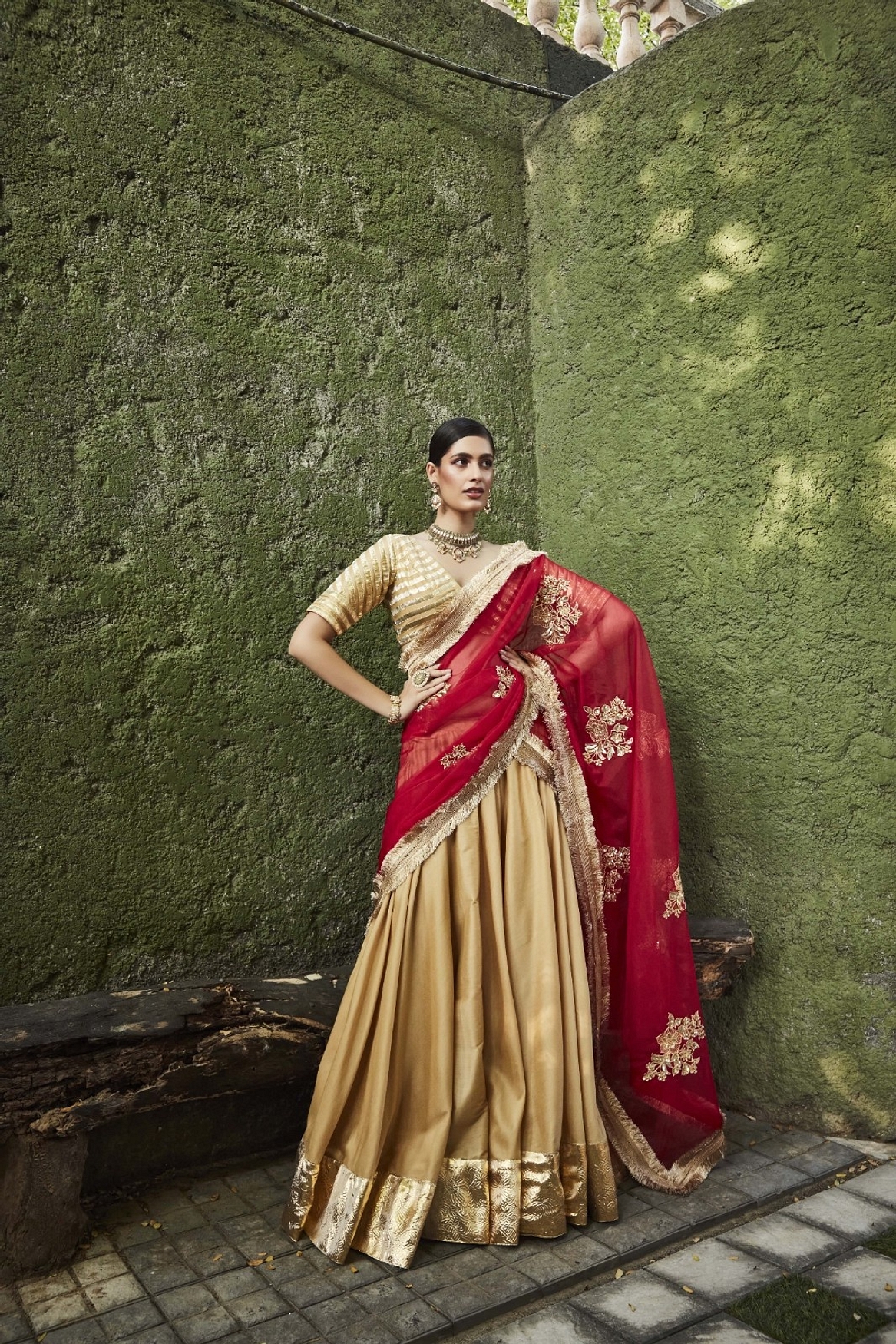 A model showcasing Gold Silk Lehenga Feature image by Ranian from Ranian's collection