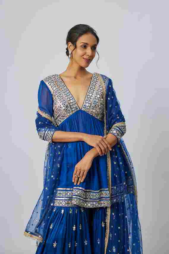 A model showcasing Inika Sharara Set by Gopi Vaid from Gopi Vaid's collection