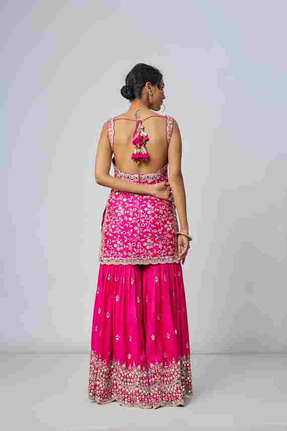 A model showcasing Pink Soneera Sharara Set by Gopi Vaid from Gopi Vaid's collection