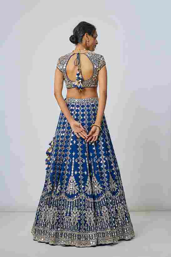 A model showcasing Rudrani Lehenga Set by Gopi Vaid from Gopi Vaid's collection