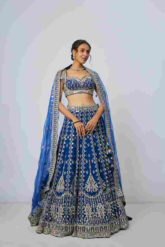 A model showcasing Rudrani Lehenga Set by Gopi Vaid from Gopi Vaid's collection