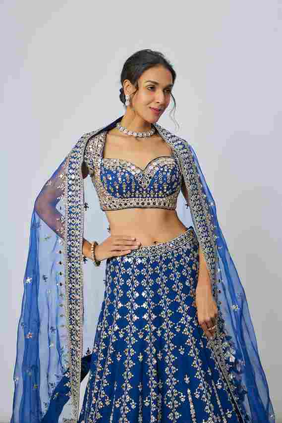 A model showcasing Rudrani Lehenga Set by Gopi Vaid from Gopi Vaid's collection