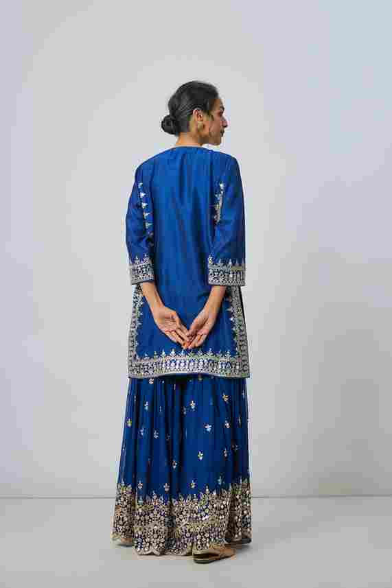 A model showcasing Blue Pariza Sharara Set by Gopi Vaid from Gopi Vaid's collection