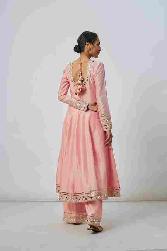 A model showcasing Pink Shraddha Ag Set by Gopi Vaid from Gopi Vaid's collection
