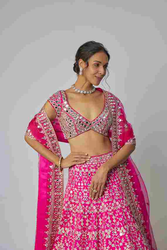 A model showcasing Niranjana Lehenga Set by Gopi Vaid from Gopi Vaid's collection