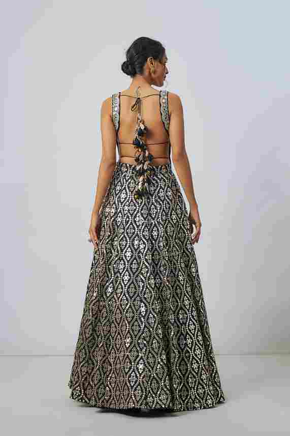 A model showcasing Roshni Lehenga Set by Gopi Vaid from Gopi Vaid's collection