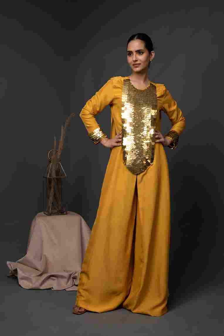 A model showcasing Alkhayma Kaftan Jumpsuit by Kanika Verma Couture from Kanika Verma Couture's collection