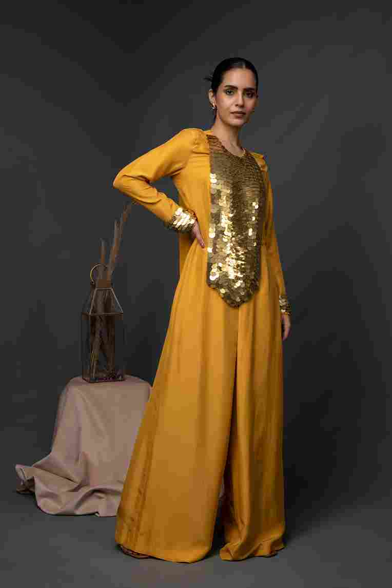 A model showcasing Alkhayma Kaftan Jumpsuit by Kanika Verma Couture from Kanika Verma Couture's collection
