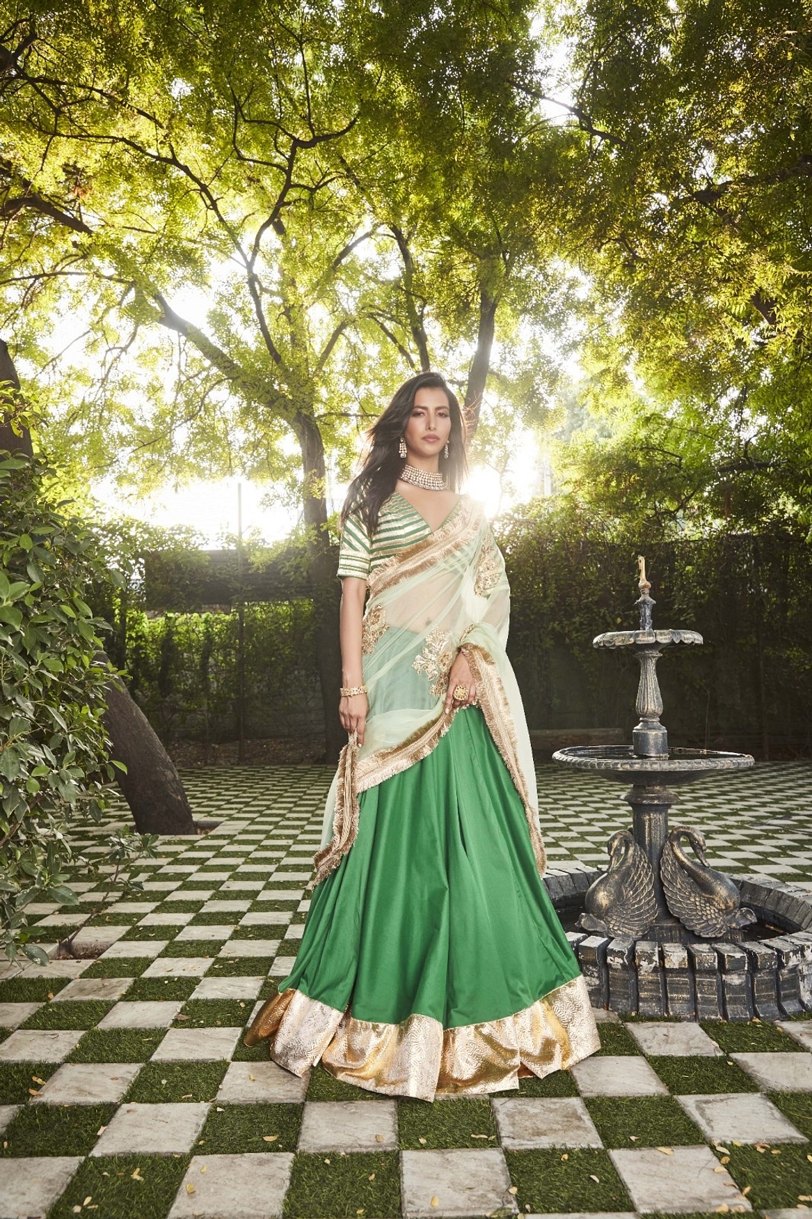 A model showcasing Green Silk Lehenga Feature image by Ranian from Ranian's collection