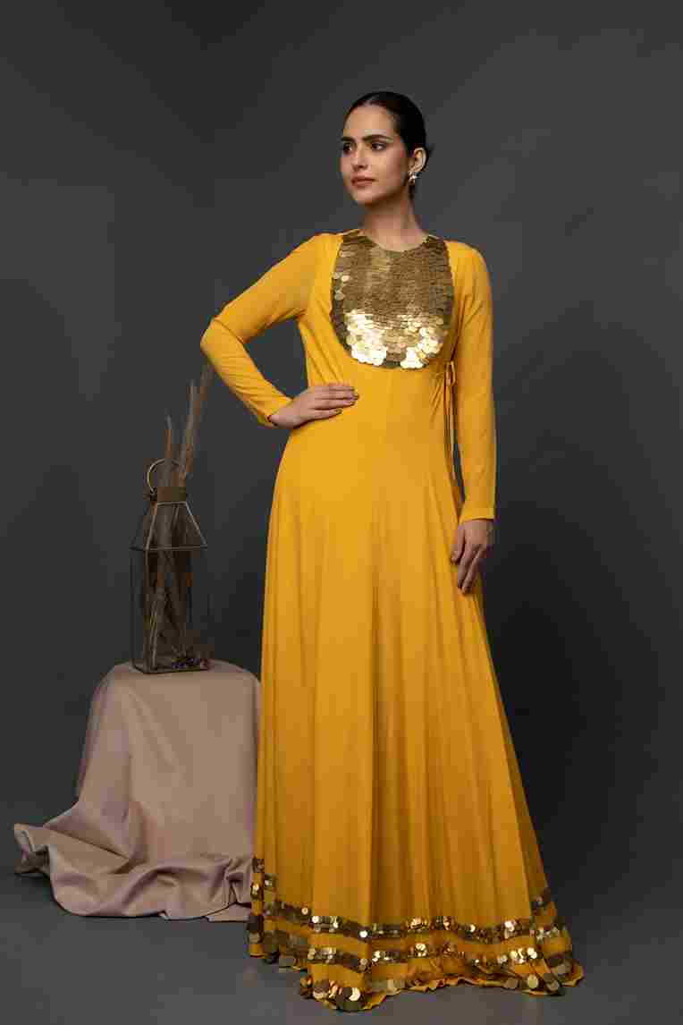 A model showcasing Fujairan Long Angrakha by Kanika Verma Couture from Kanika Verma Couture's collection