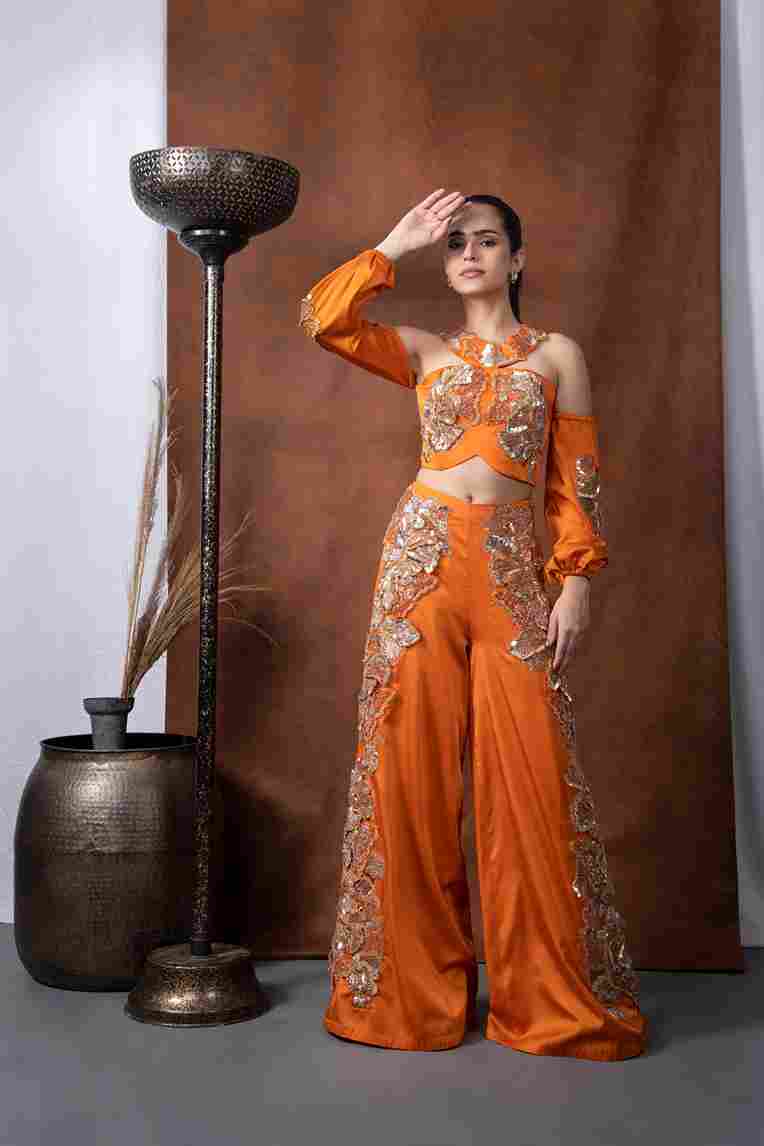 A model showcasing Arabian Halter Top by Kanika Verma Couture from Kanika Verma Couture's collection