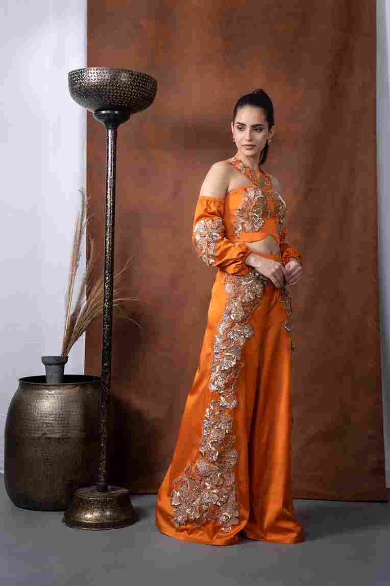 A model showcasing Arabian Halter Top by Kanika Verma Couture from Kanika Verma Couture's collection