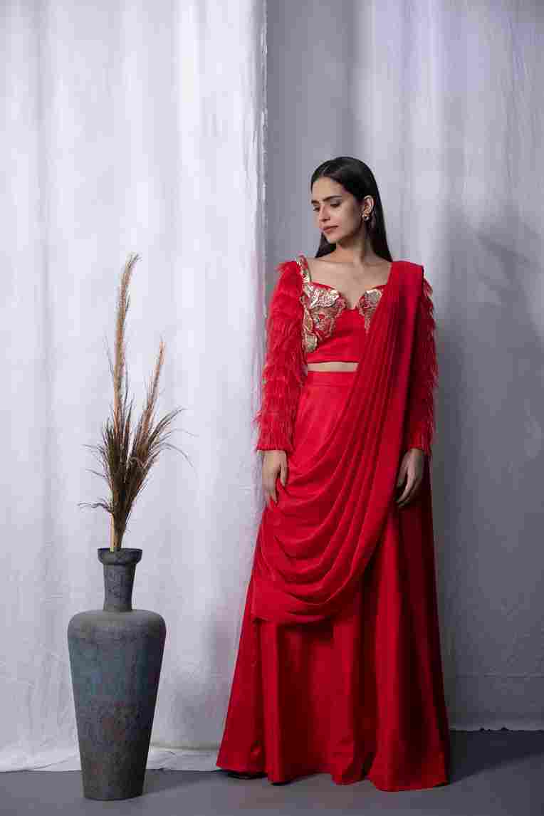 A model showcasing Alsouk Bralet Drape Saree by Kanika Verma Couture from Kanika Verma Couture's collection