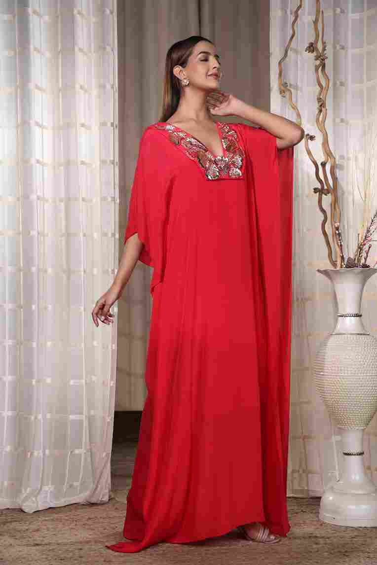A model showcasing Red Flowy Kaaftan by Kanika Verma Couture from Kanika Verma Couture's collection